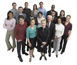 A group of people standing together in front of each other.